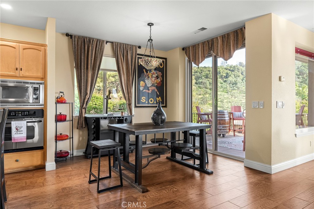3560 Shadowtree Lane Chico, CA 95928 - Photo 14 of 52 a view of a dining room with furniture window and outside view