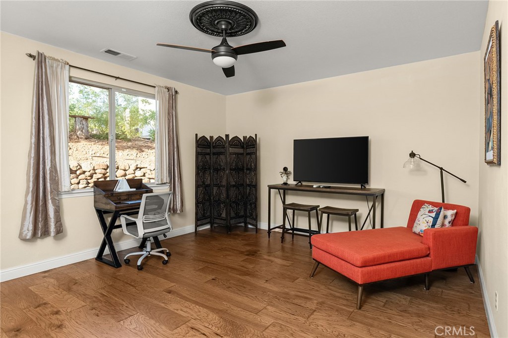 3560 Shadowtree Lane Chico, CA 95928 - Photo 16 of 52 a living room with furniture and a flat screen tv
