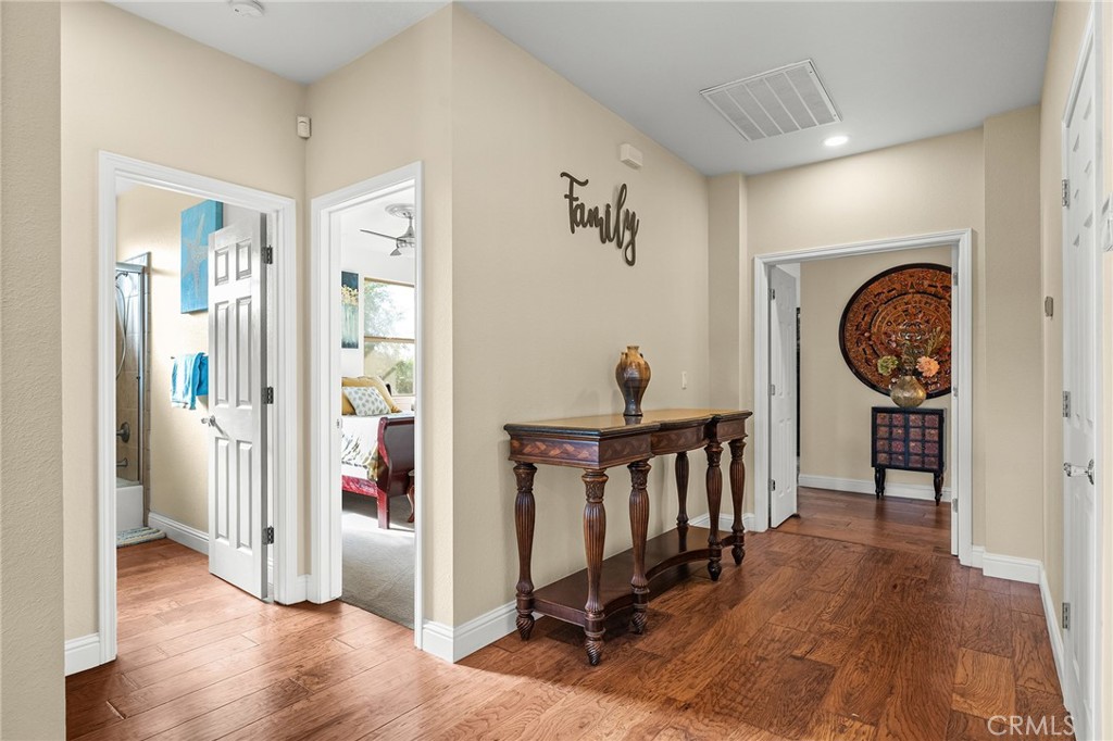3560 Shadowtree Lane Chico, CA 95928 - Photo 18 of 52 a view of a hallway with wooden floor and entryway