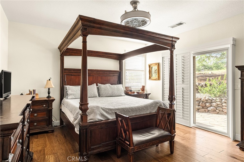 3560 Shadowtree Lane Chico, CA 95928 - Photo 19 of 52 a bedroom with a bed and a large window