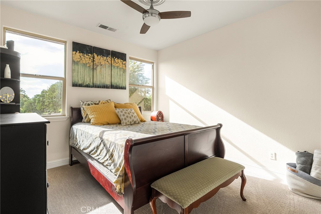 3560 Shadowtree Lane Chico, CA 95928 - Photo 25 of 52 a bedroom with a bed and window