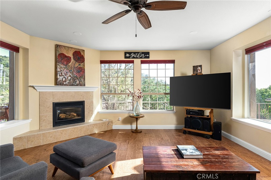 3560 Shadowtree Lane Chico, CA 95928 - Photo 7 of 52 a living room with furniture a window and a fireplace