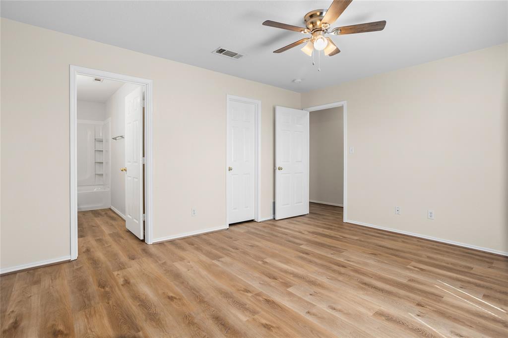 753 Olive Branch Road Weatherford, TX 76087 - Photo 13 of 21 wooden floor in an empty room