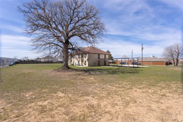 a house view with a garden space