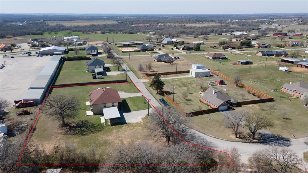 753 Olive Branch Road Weatherford, TX 76087 - Photo 21 of 21 an aerial view of a house with a mountain