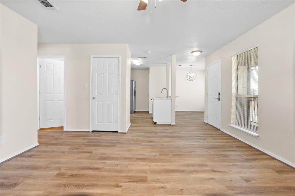 753 Olive Branch Road Weatherford, TX 76087 - Photo 9 of 21 a view of empty room with wooden floor