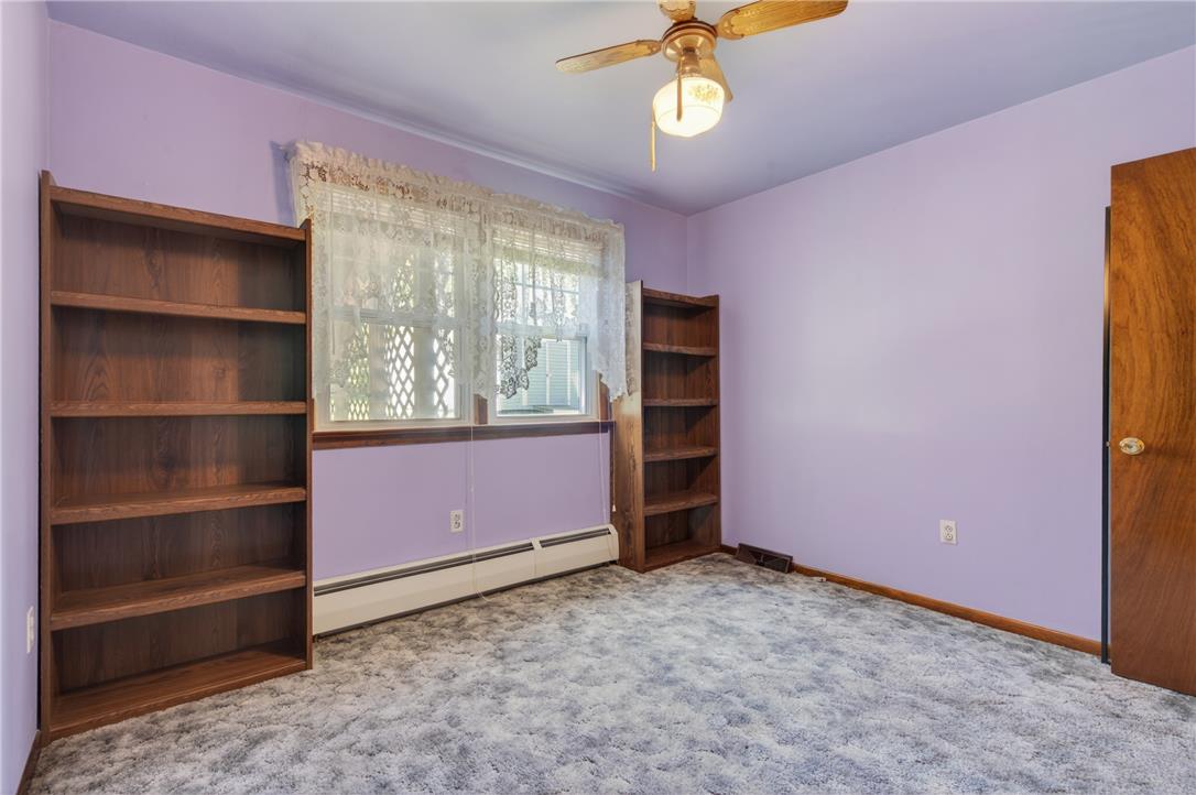 62 Stoney Road Tamaqua, PA 18252 - Photo 36 of 61 A restful chamber offers comfortable carpeting, ample shelving, and a ceiling fan for year-round comfort.