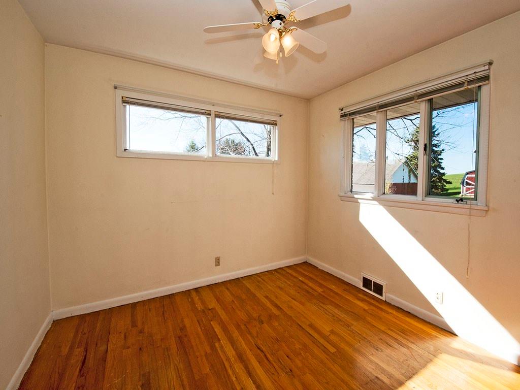 4456 Ellwood Road New Castle, PA 16101 - Photo 13 of 25 Original hardwood floors carry throughout the bedrooms.