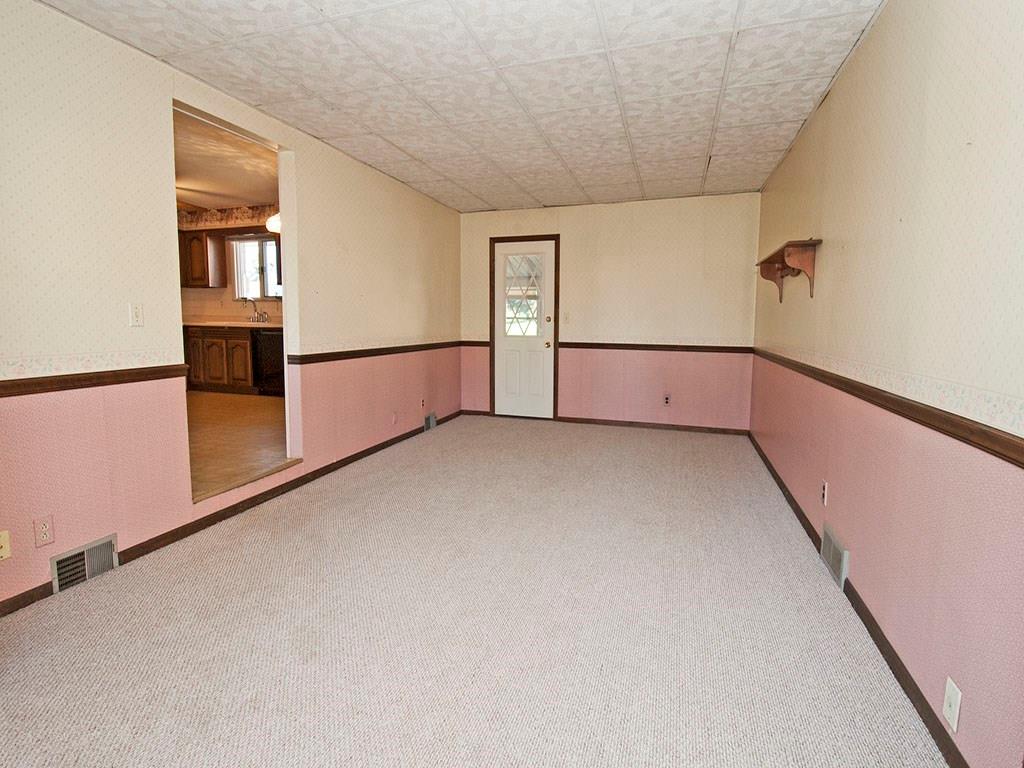 4456 Ellwood Road New Castle, PA 16101 - Photo 16 of 25 Family room or office space features new carpet!