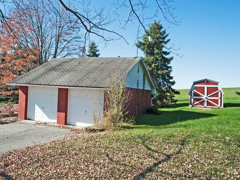 4456 Ellwood Road New Castle, PA 16101 - Photo 22 of 25 The detached 2 car garage is heated and fully insulated. The shed has a new roof.