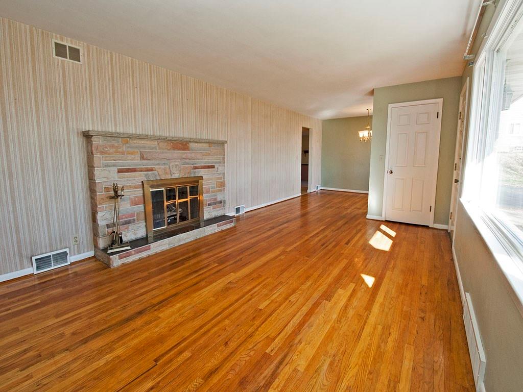 4456 Ellwood Road New Castle, PA 16101 - Photo 6 of 25 The gas fireplace is the centerpiece of the room!