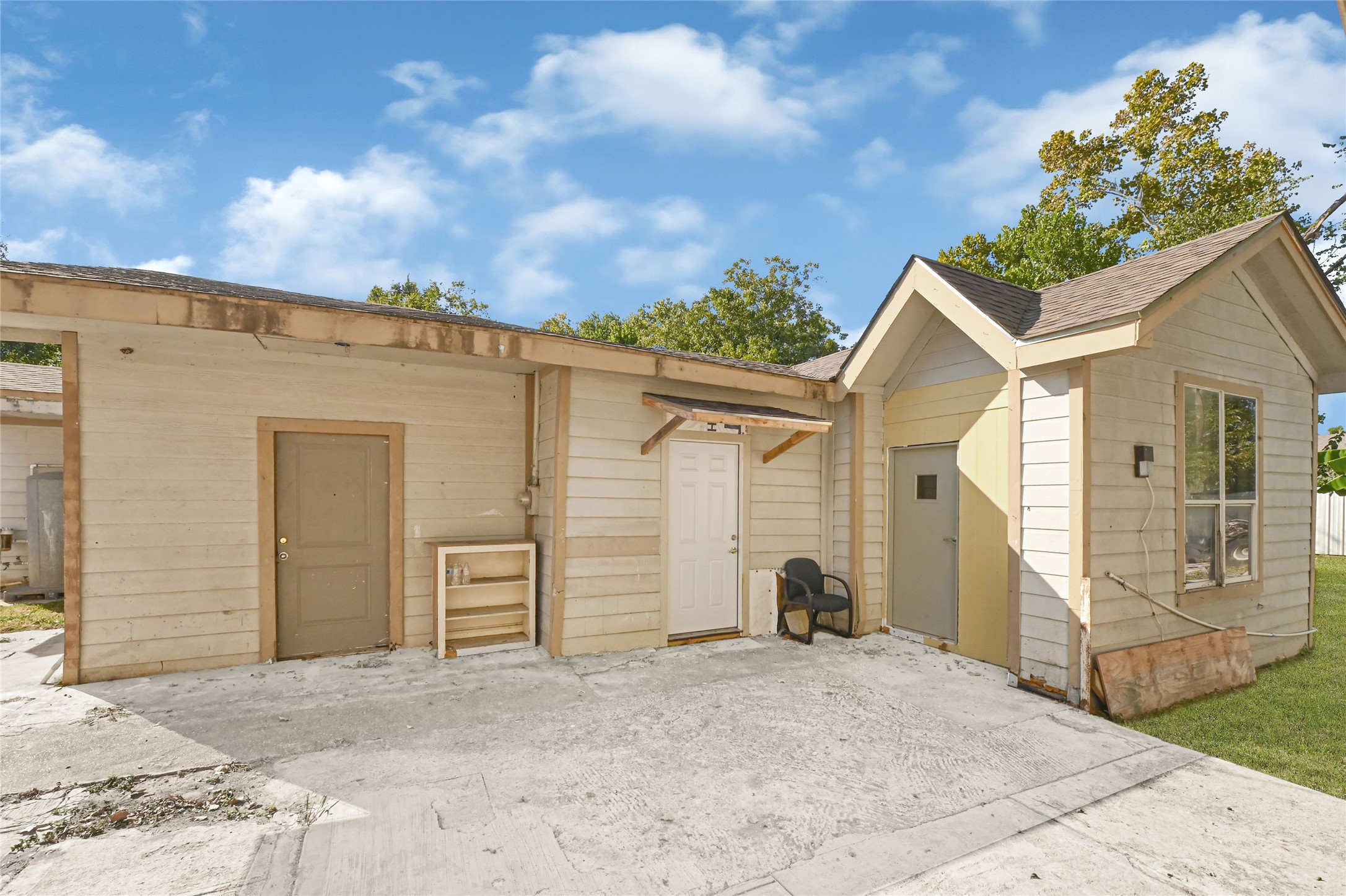 1925 Sunny Drive Houston, TX 77093 - Photo 23 of 24 a view of a house with a backyard and a garage