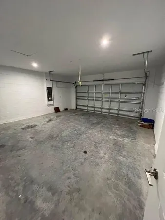 a bed room with a bed and a night stand