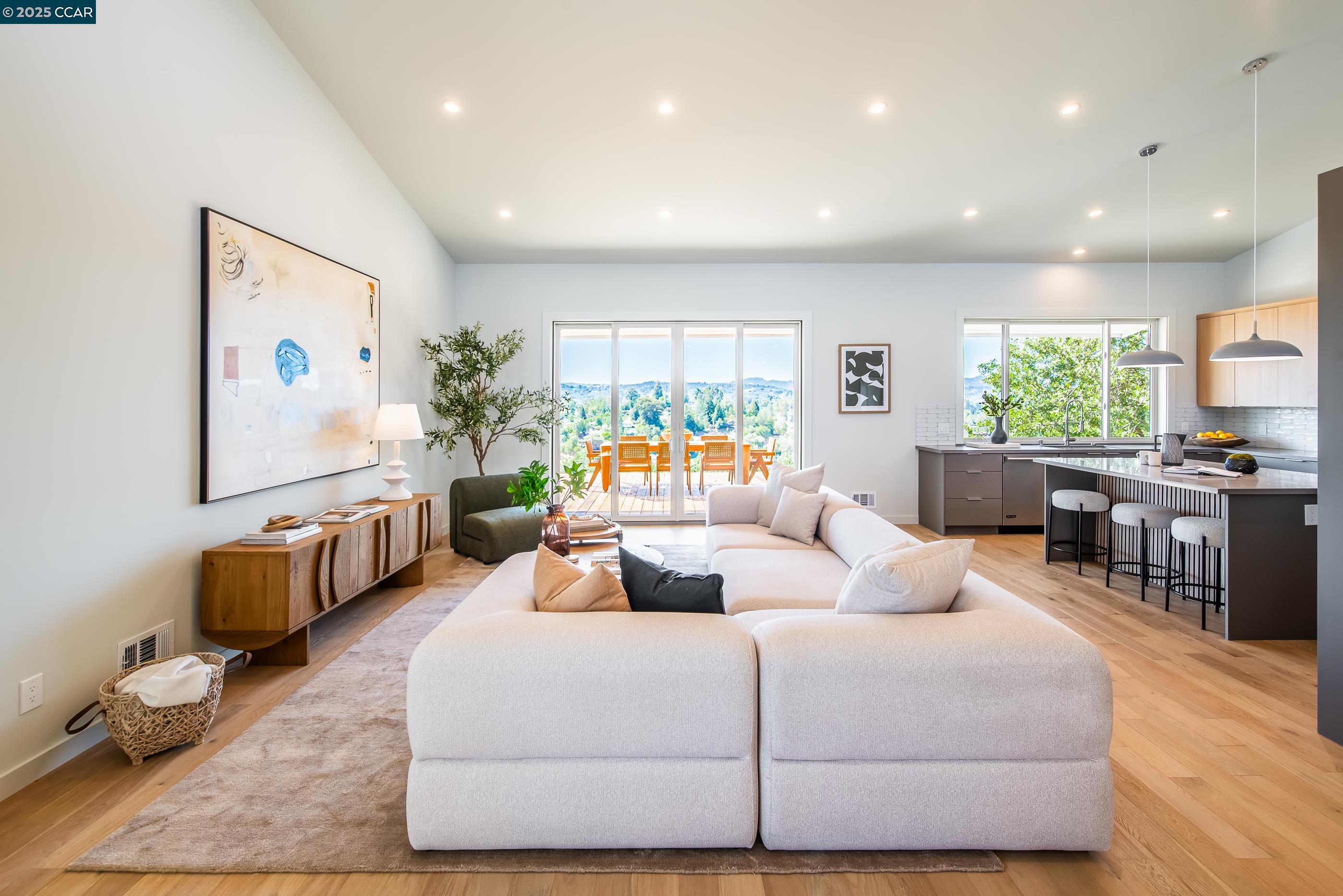 105 Hillcroft Way Walnut Creek, CA 94597 - Photo 11 of 56 a living room with furniture and a large window