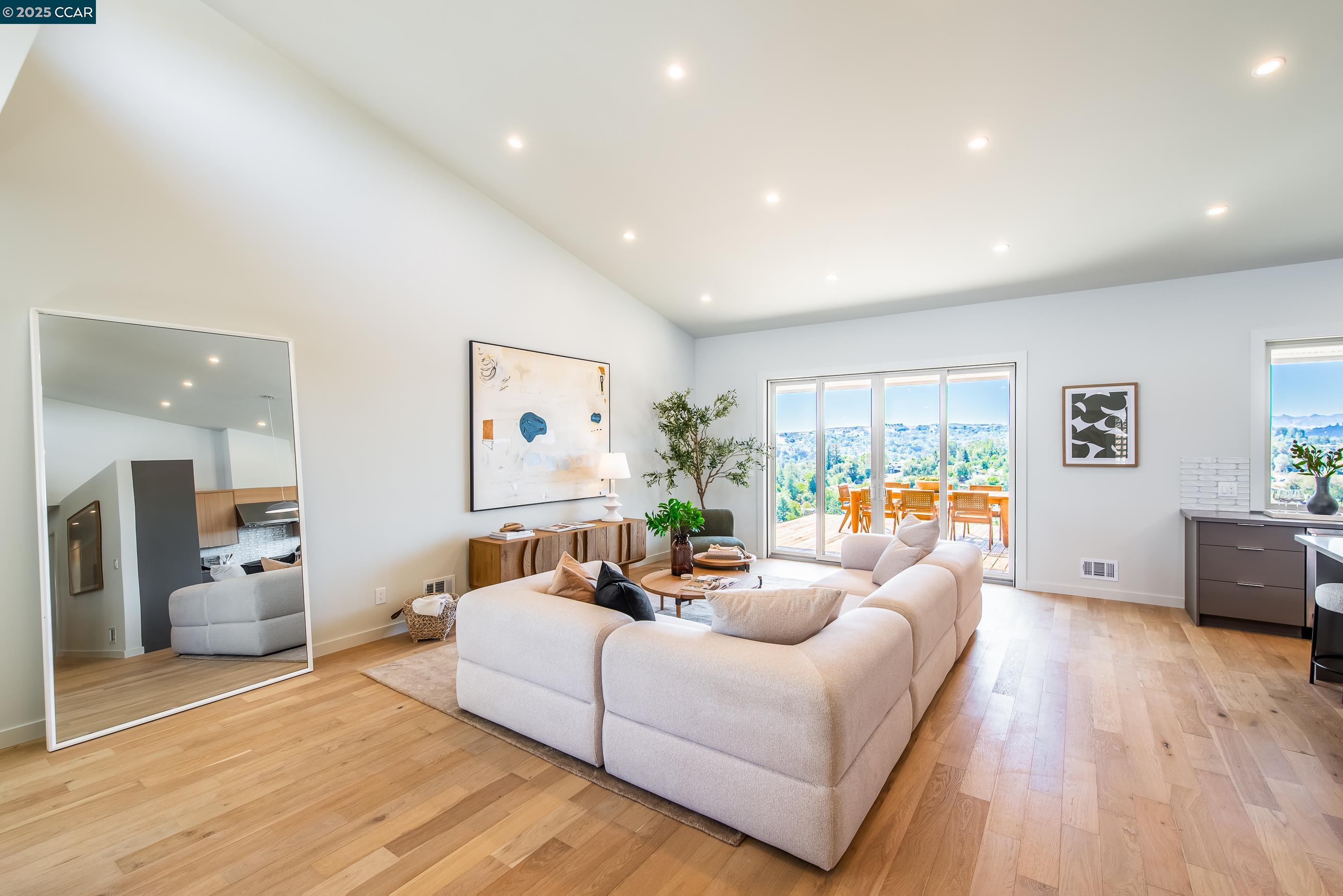 105 Hillcroft Way Walnut Creek, CA 94597 - Photo 12 of 56 a living room with furniture and a wooden floor