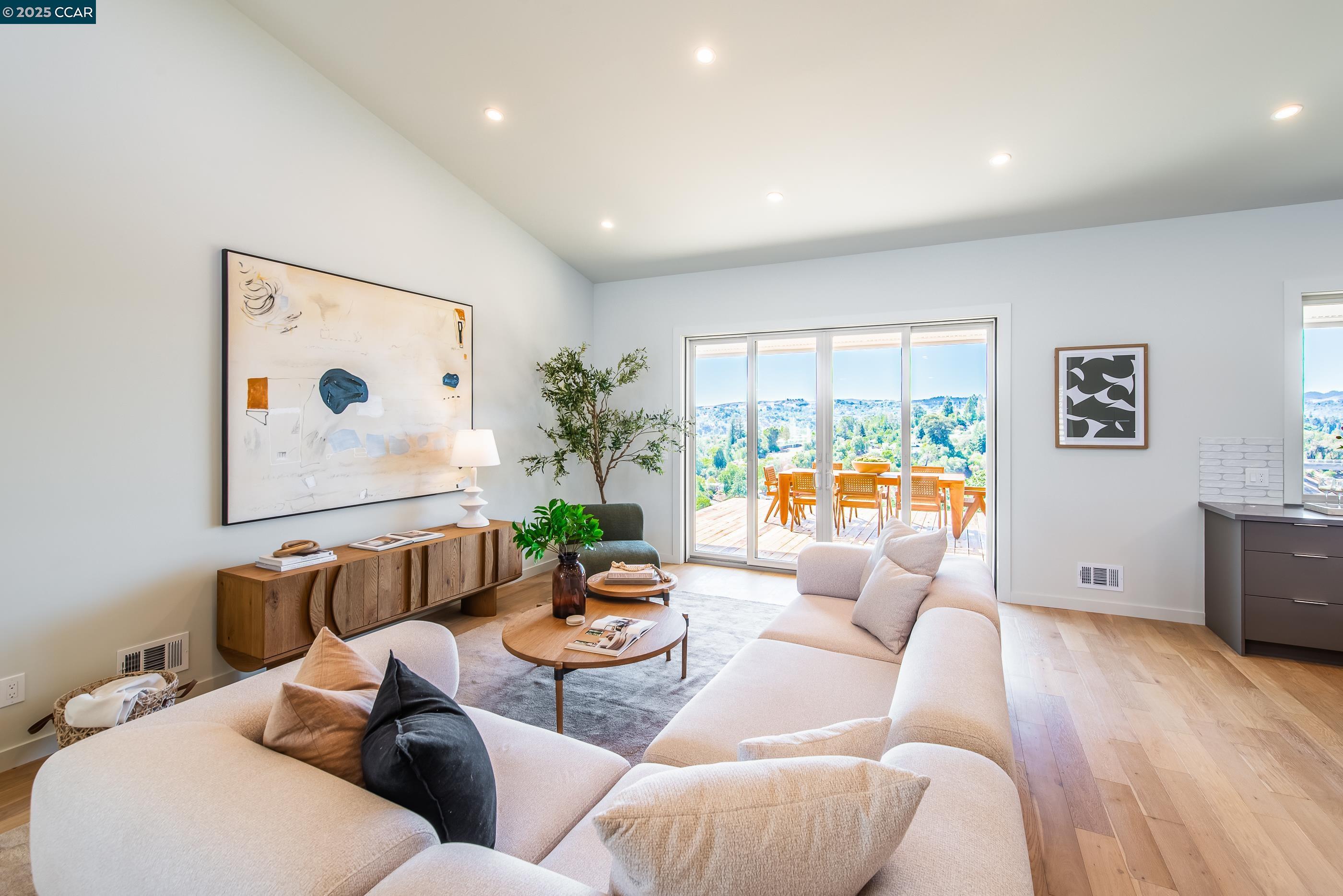 105 Hillcroft Way Walnut Creek, CA 94597 - Photo 13 of 56 a living room with furniture and a flat screen tv