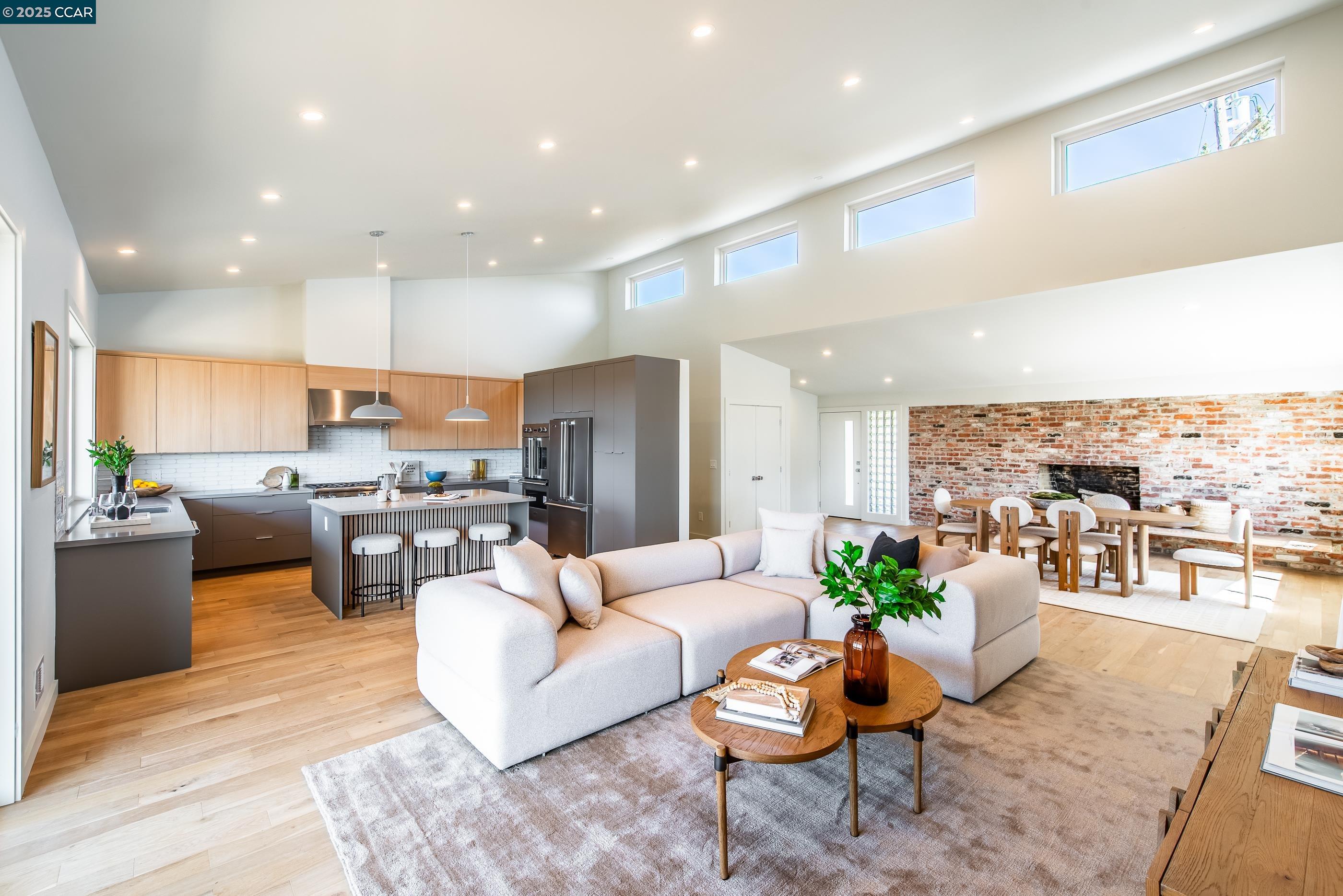 105 Hillcroft Way Walnut Creek, CA 94597 - Photo 17 of 56 a living room with furniture kitchen view and a large window