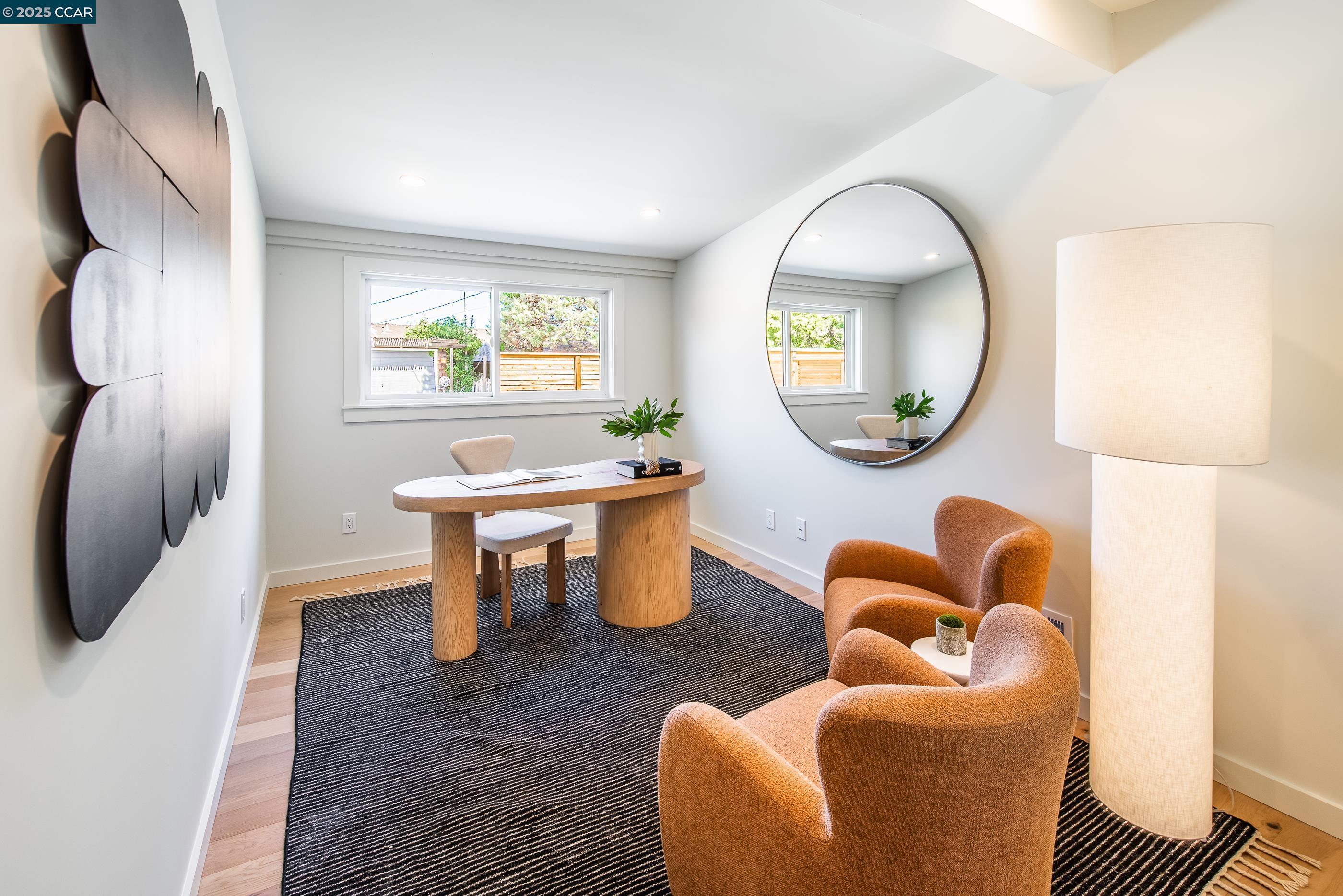 105 Hillcroft Way Walnut Creek, CA 94597 - Photo 36 of 56 a living room with furniture and a mirror