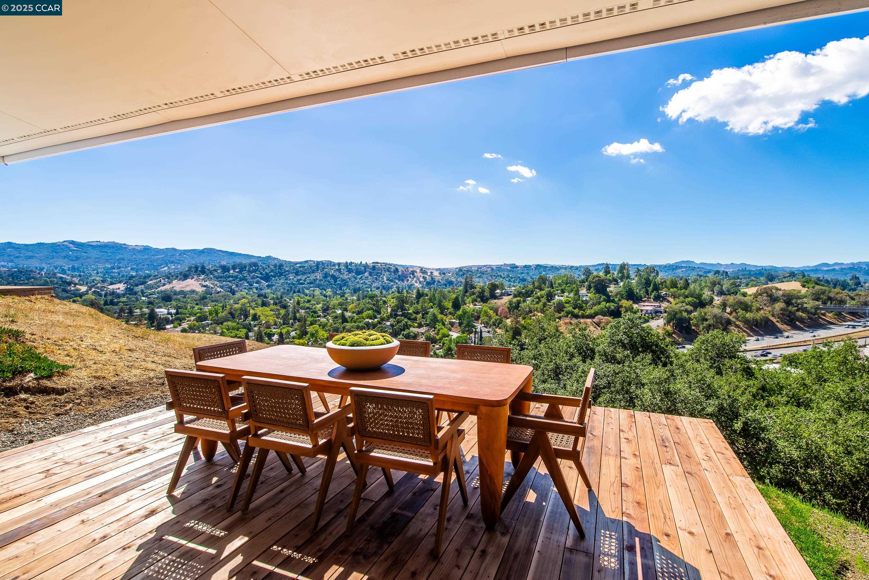 105 Hillcroft Way Walnut Creek, CA 94597 - Photo 43 of 56 a view of a terrace with furniture and a table