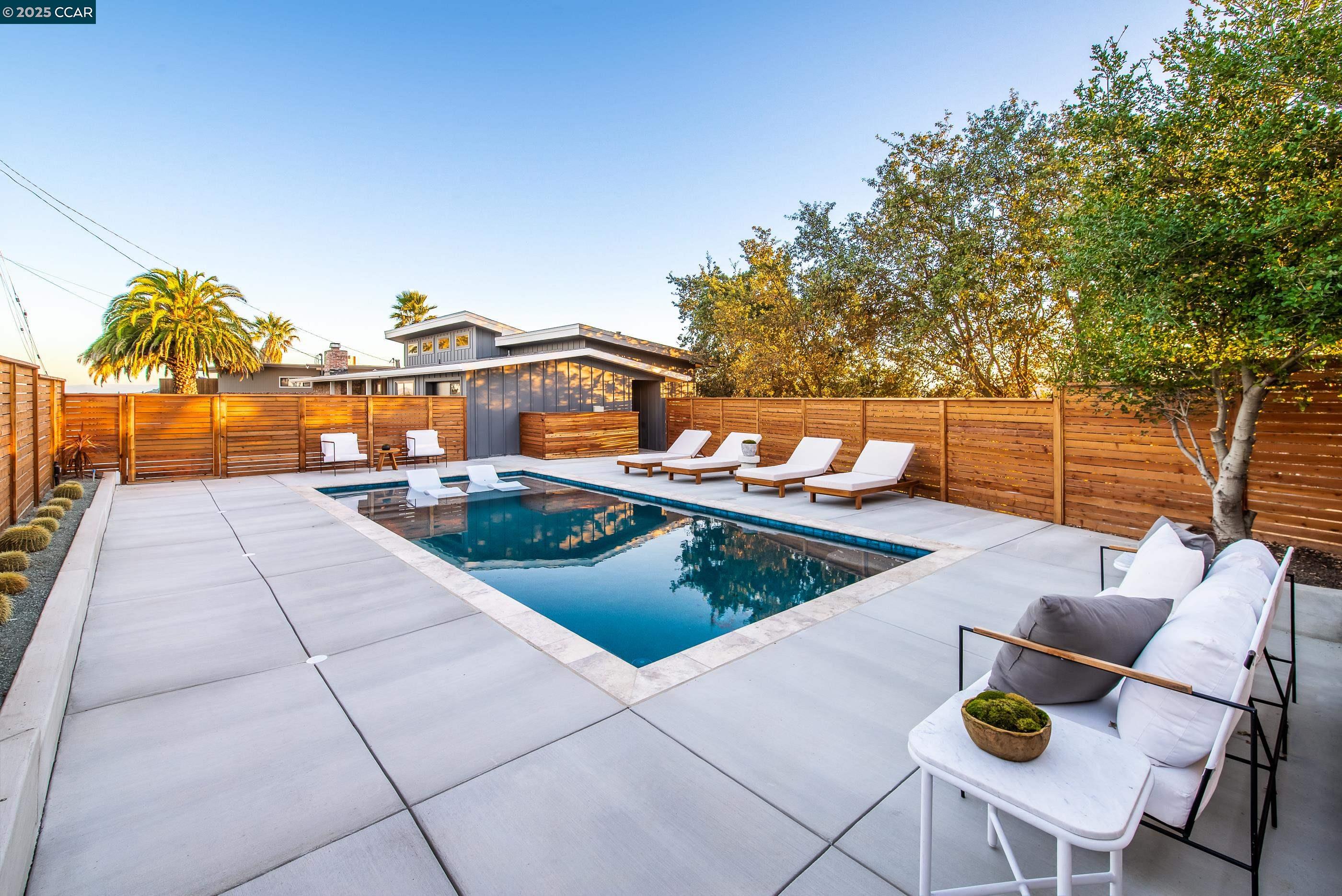 105 Hillcroft Way Walnut Creek, CA 94597 - Photo 48 of 56 a backyard of a house with table and chairs