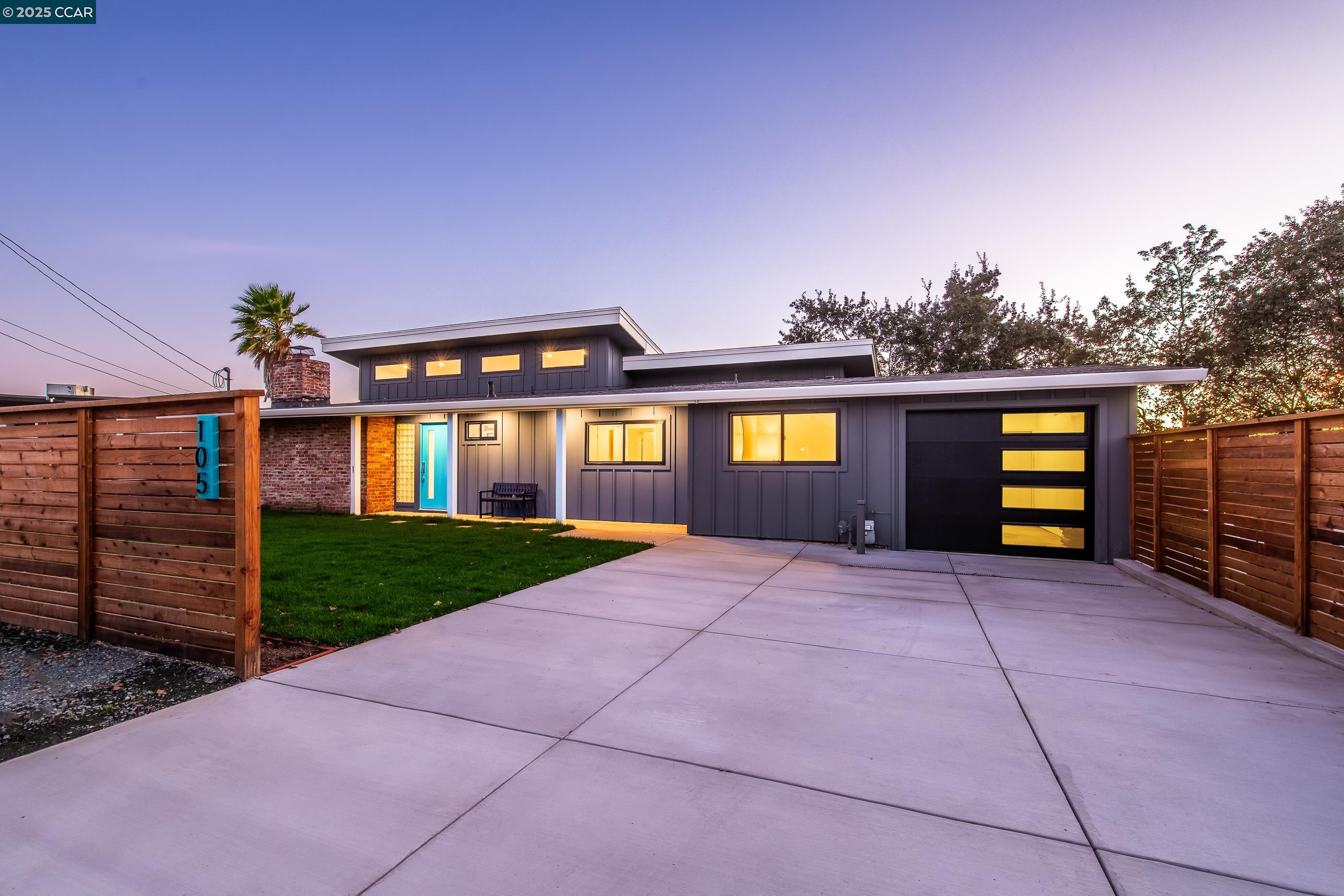 105 Hillcroft Way Walnut Creek, CA 94597 - Photo 54 of 56 a view of a house with a yard and garage