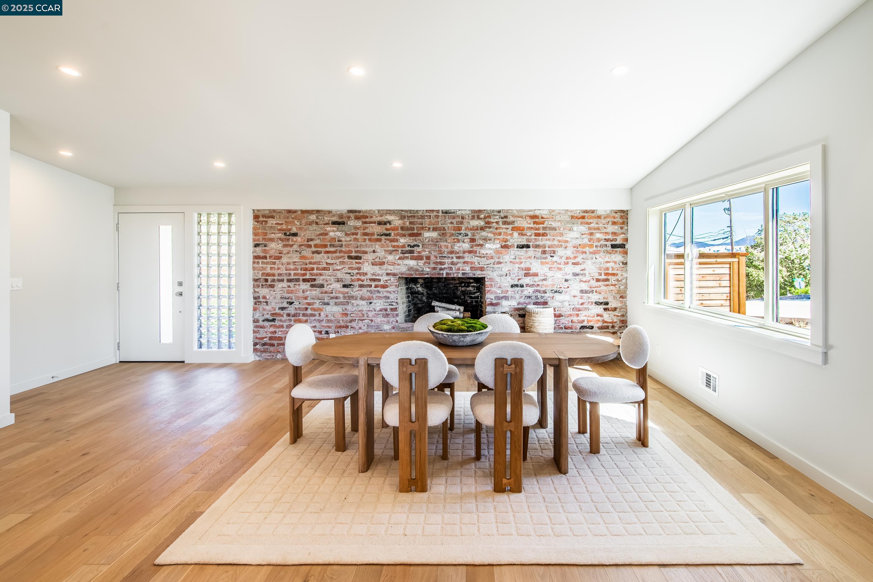 105 Hillcroft Way Walnut Creek, CA 94597 - Photo 7 of 56 a dining room with furniture and wooden floor