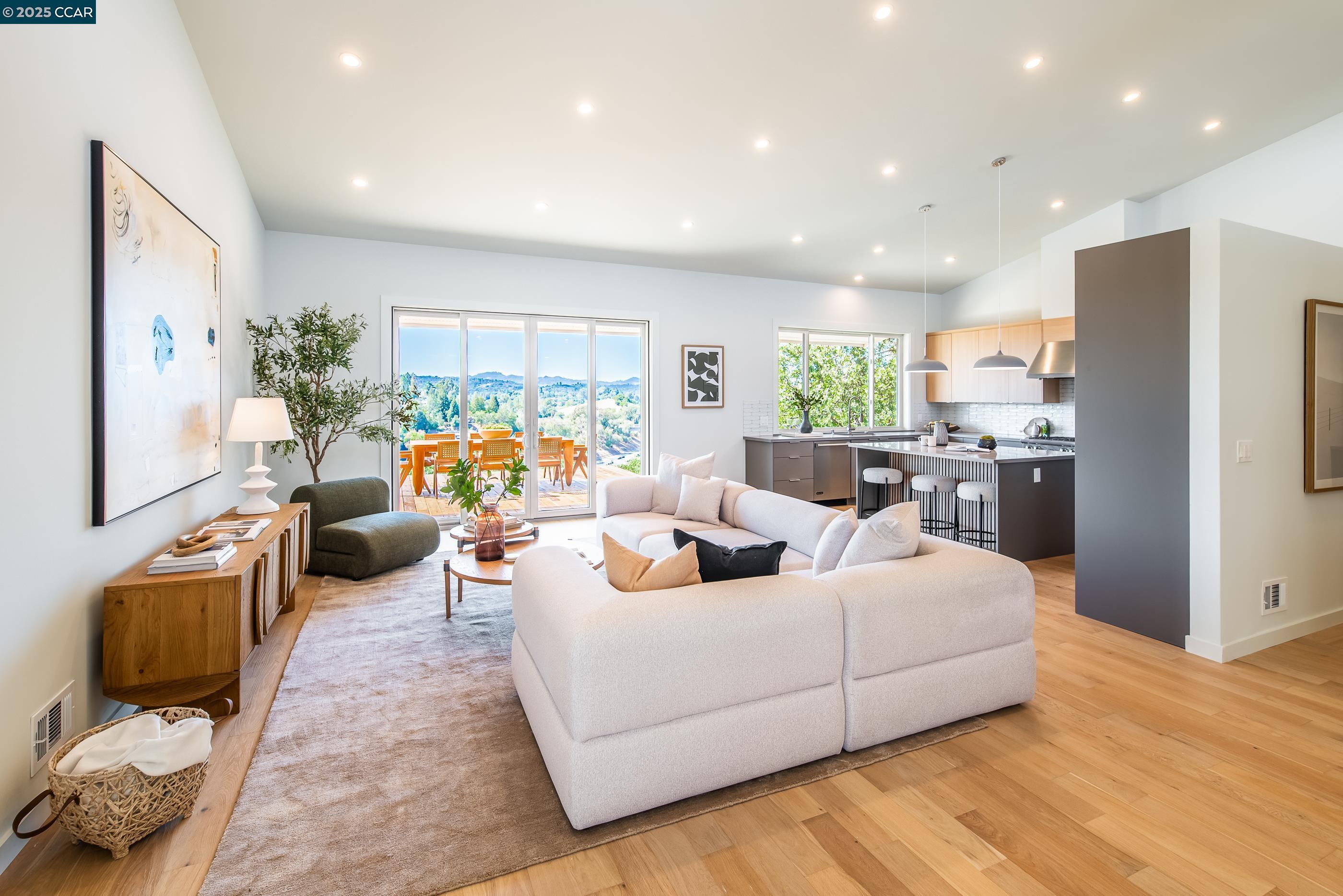 105 Hillcroft Way Walnut Creek, CA 94597 - Photo 10 of 56 a living room with furniture and a flat screen tv