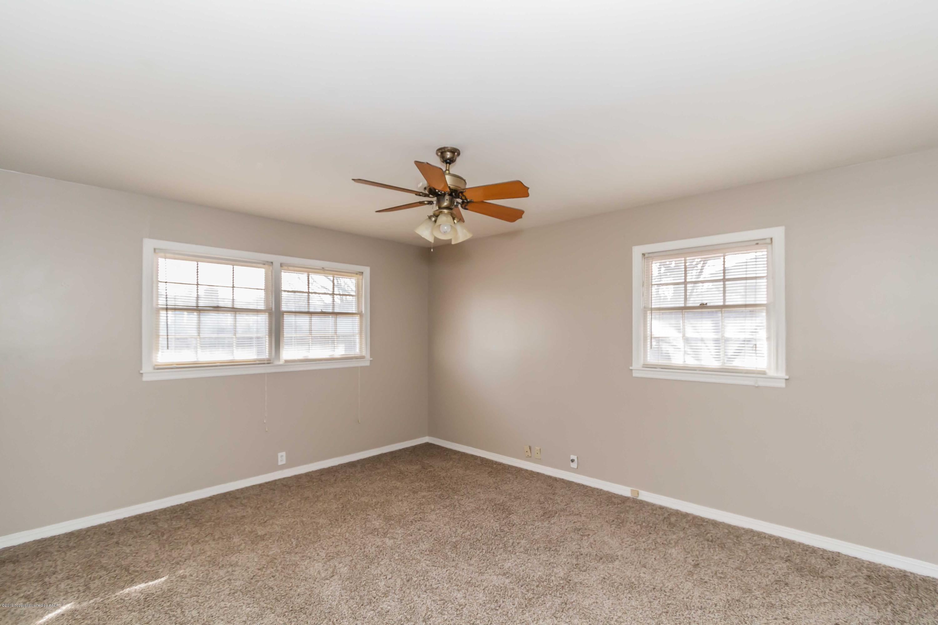 6205 Calumet Road Amarillo, TX 79106 - Photo 21 of 39 an empty room with a window