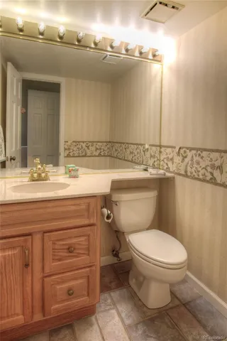 an empty room with a bathroom