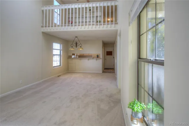 a view of entryway with kitchen