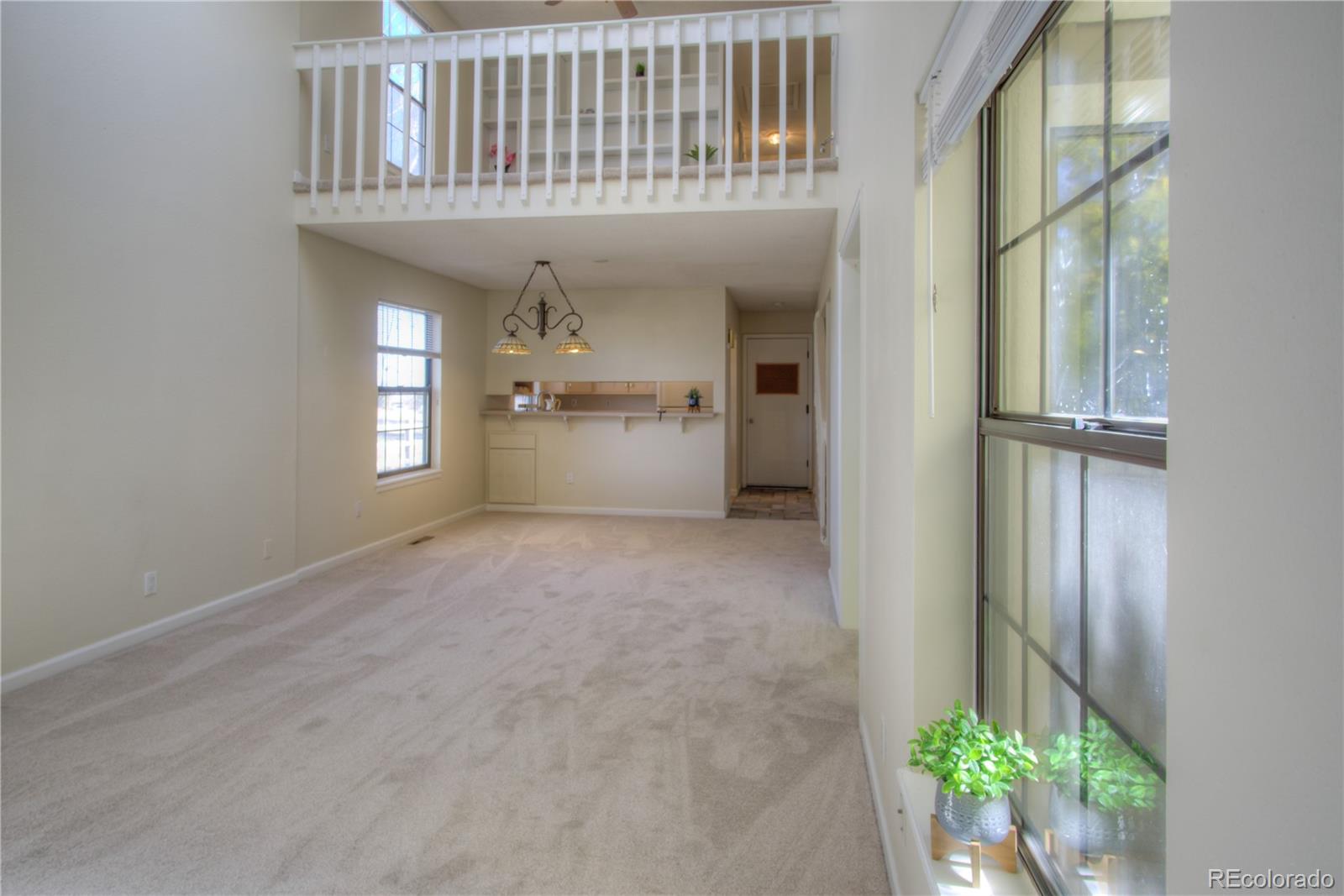 11781 West Elk Head Range Road Littleton, CO 80127 - Photo 7 of 48 a view of entryway with kitchen