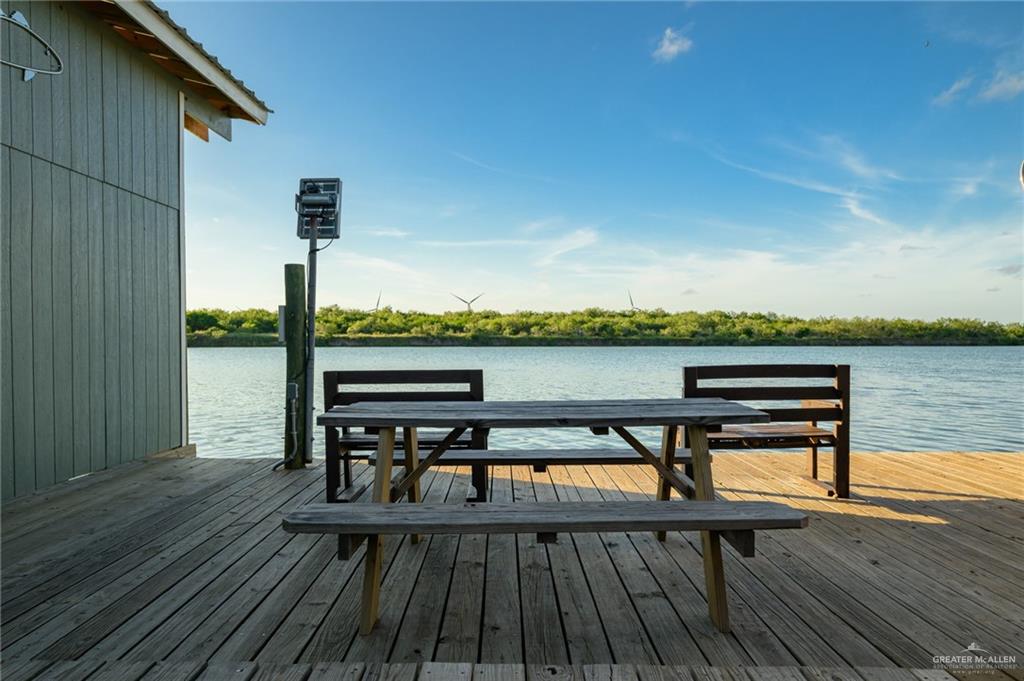 36431 Marshall Hutts Road Rio Hondo, TX 78583 - Photo 35 of 45 a view of a terrace with wooden floor and outdoor space