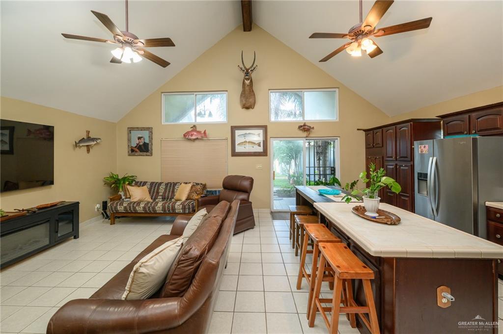 36431 Marshall Hutts Road Rio Hondo, TX 78583 - Photo 4 of 45 a view of a livingroom with furniture and a chandelier