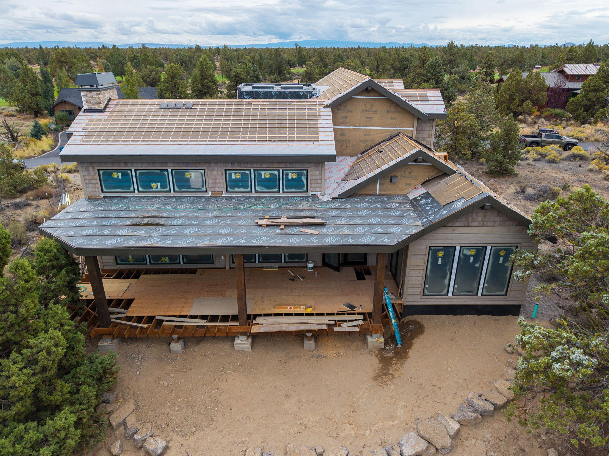 22936 Ghost Tree Lane Bend, OR 97701 - Photo 6 of 74 a aerial view of a house with a yard and seating space