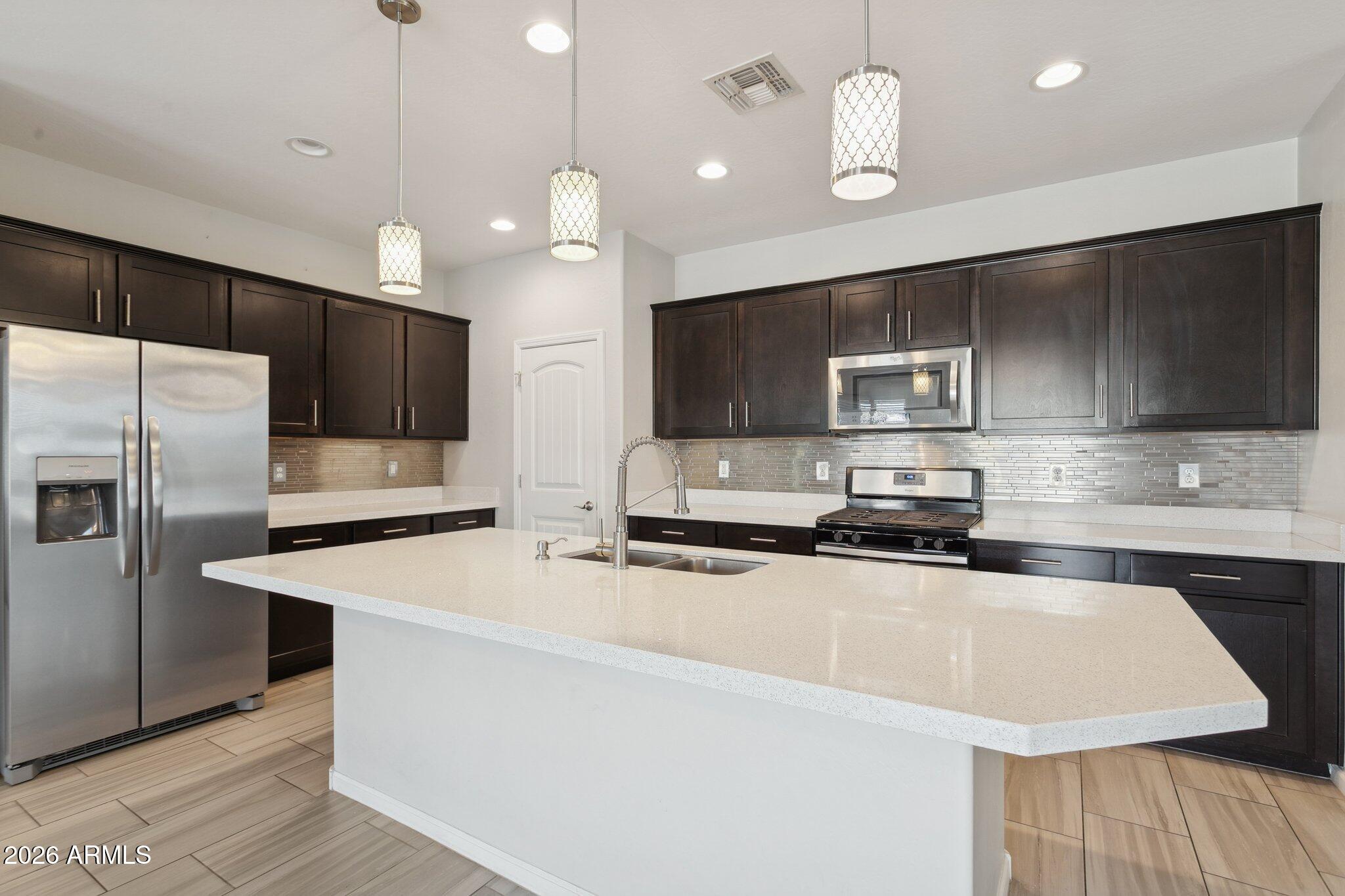 12242 West Briles Road Peoria, AZ 85383 - Photo 10 of 46 Gourmet Kitchen