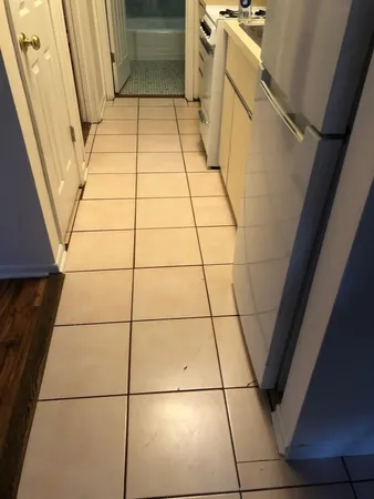 a bathroom with a shower and a mirror