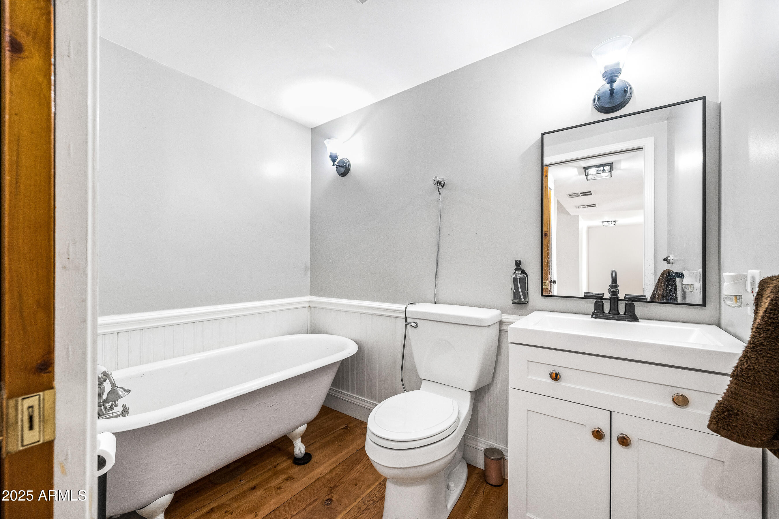 17288 Foothill Road Yarnell, AZ 85362 - Photo 29 of 79 a bathroom with a sink a toilet a mirror and shower