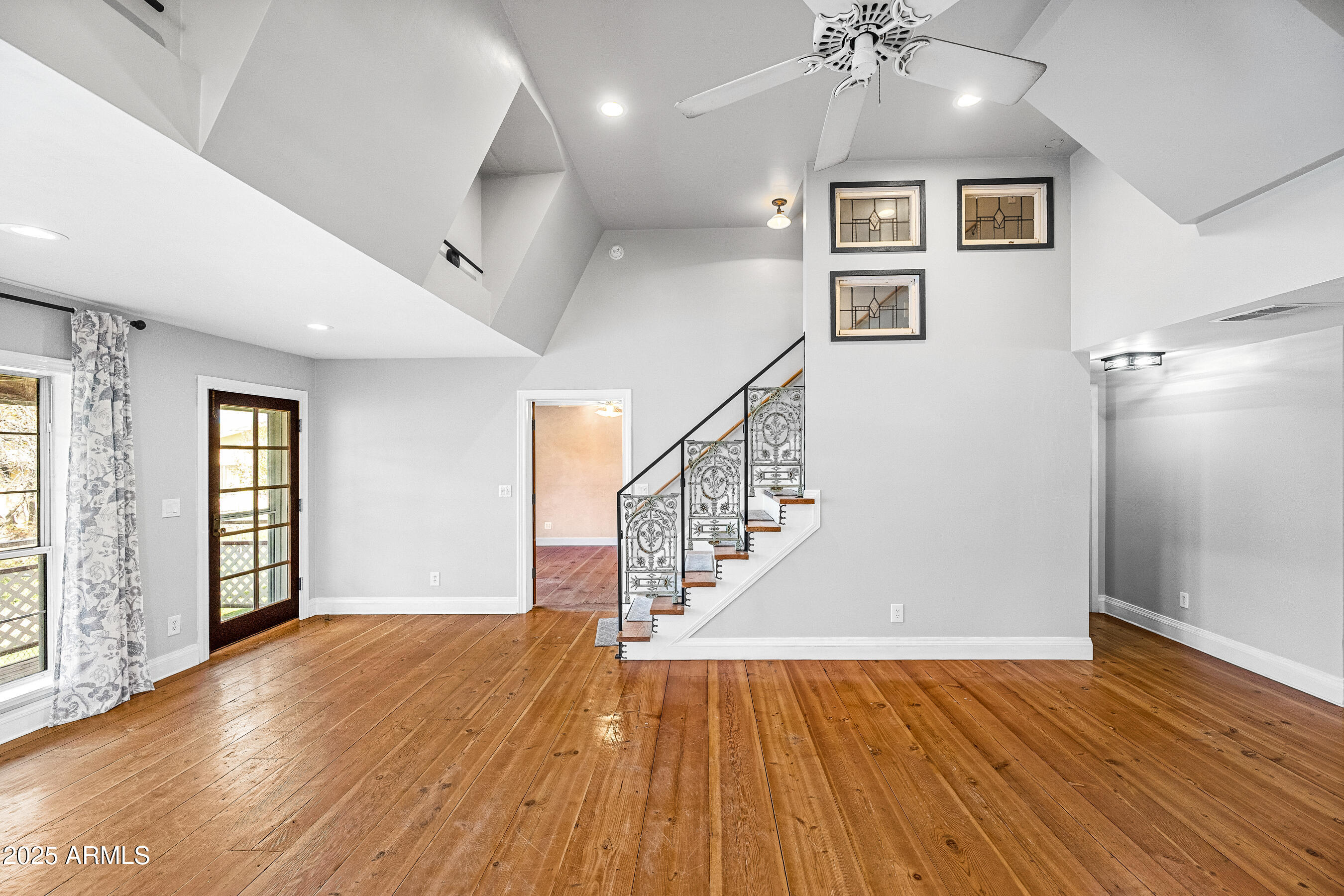 17288 Foothill Road Yarnell, AZ 85362 - Photo 31 of 79 wooden floor in an empty room with a window and wooden floor