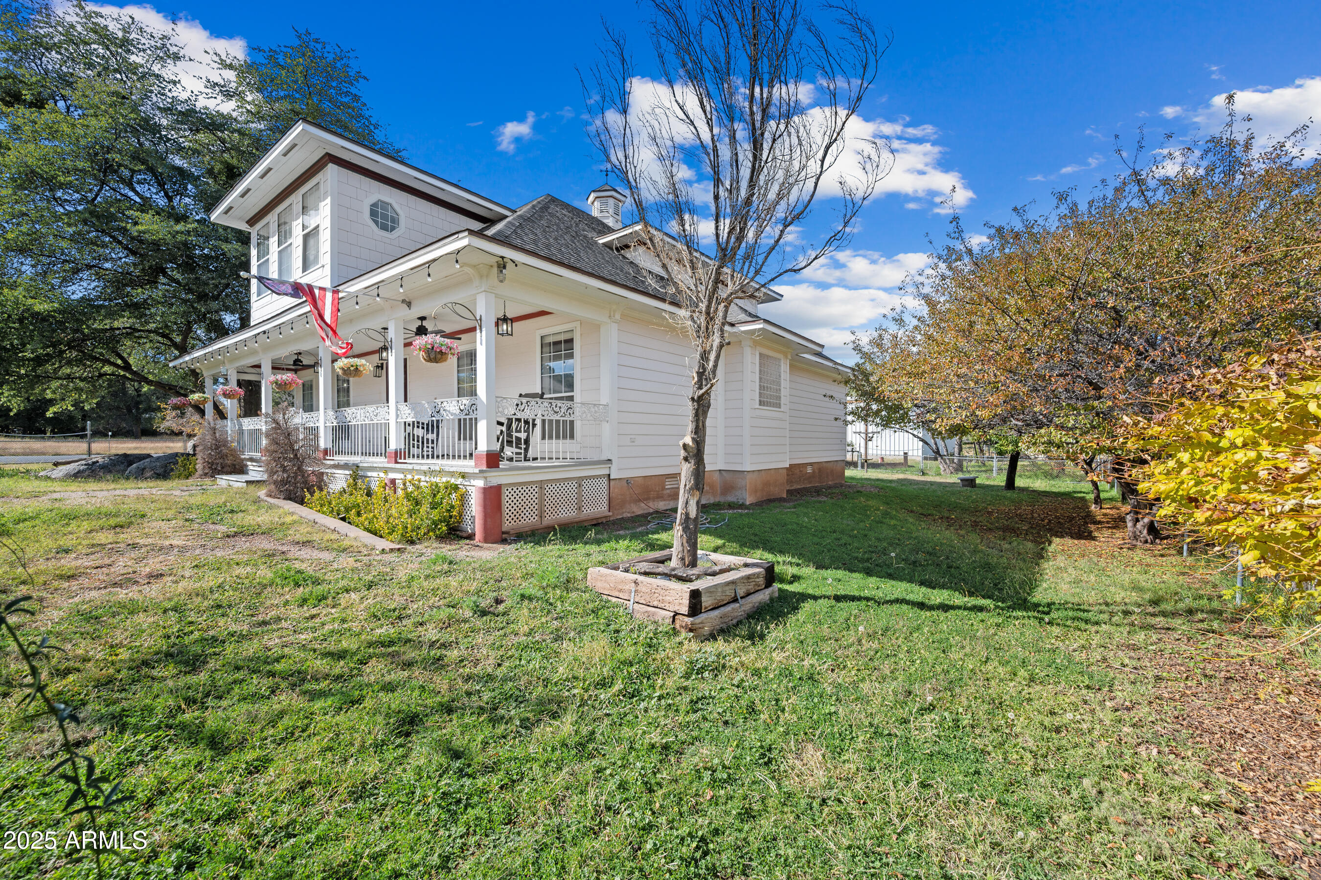 17288 Foothill Road Yarnell, AZ 85362 - Photo 59 of 79 a front view of a house with a yard and fountain