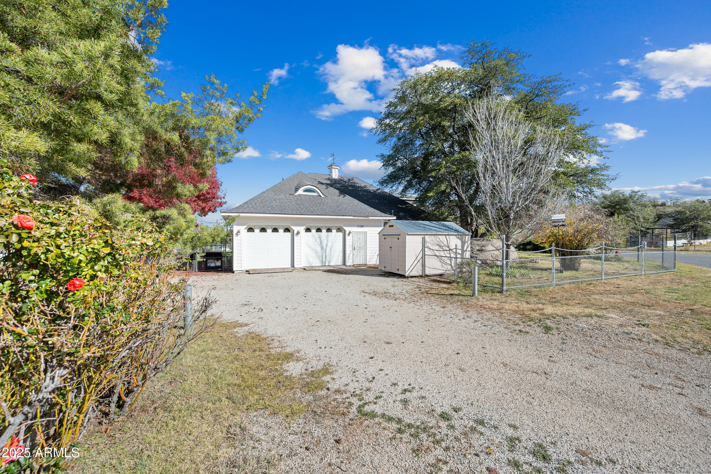17288 Foothill Road Yarnell, AZ 85362 - Photo 65 of 79 a view of a house with a yard and garage