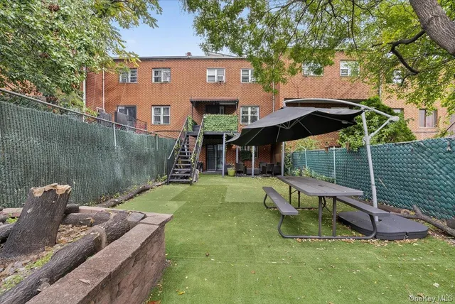 a view of a chairs and tables in patio