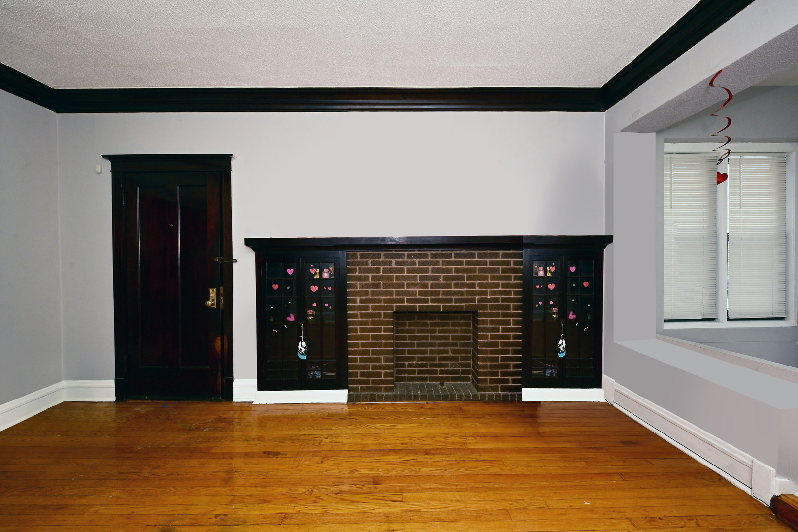7347 South Calumet Avenue Chicago, IL 60619 - Photo 15 of 27 a view of an empty room with wooden floor
