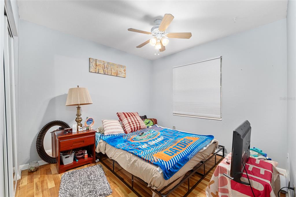 1420 Southwest 42nd Street, Unit B Gainesville, FL 32607 - Photo 24 of 36 a living room with furniture and a rug