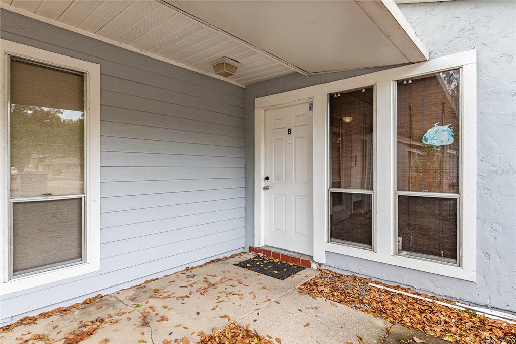 1420 Southwest 42nd Street, Unit B Gainesville, FL 32607 - Photo 6 of 36 a view of a door front of a house
