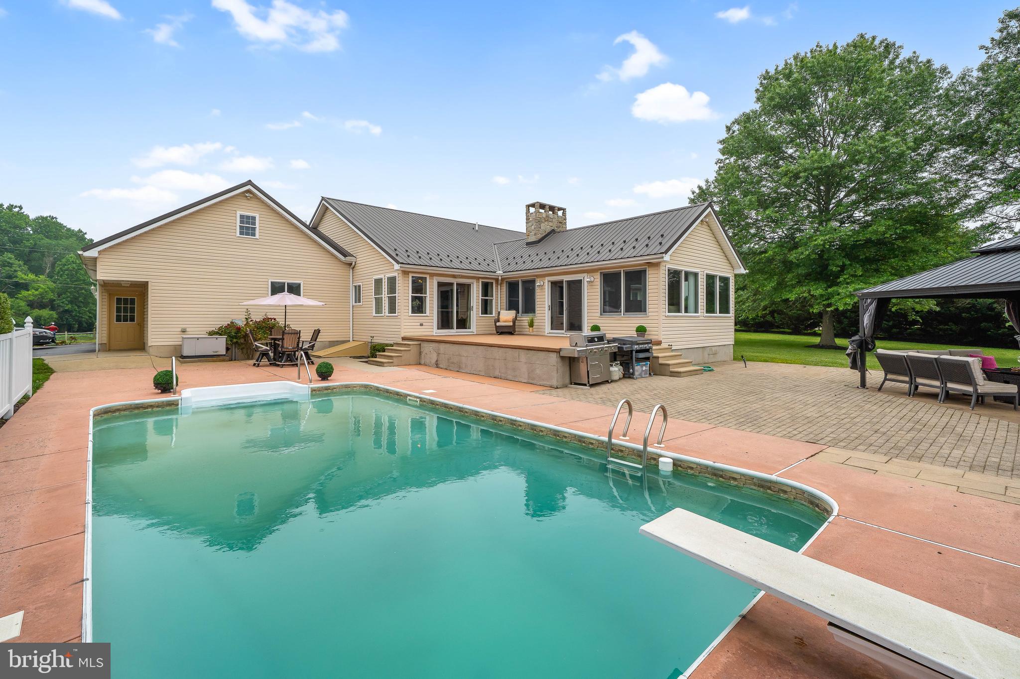 284 Little New York Road Rising Sun, MD 21911 - Photo 46 of 61 16 x 32 in ground 8' deep pool with diving board