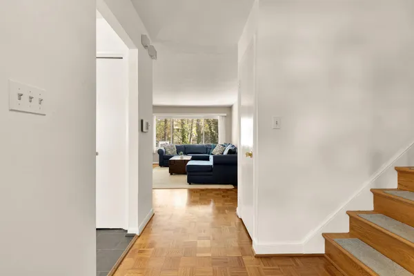 a view of a living room with furniture