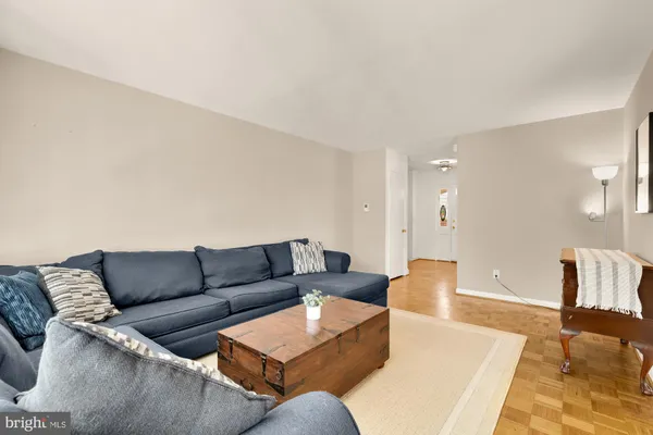 a living room with furniture and a couch