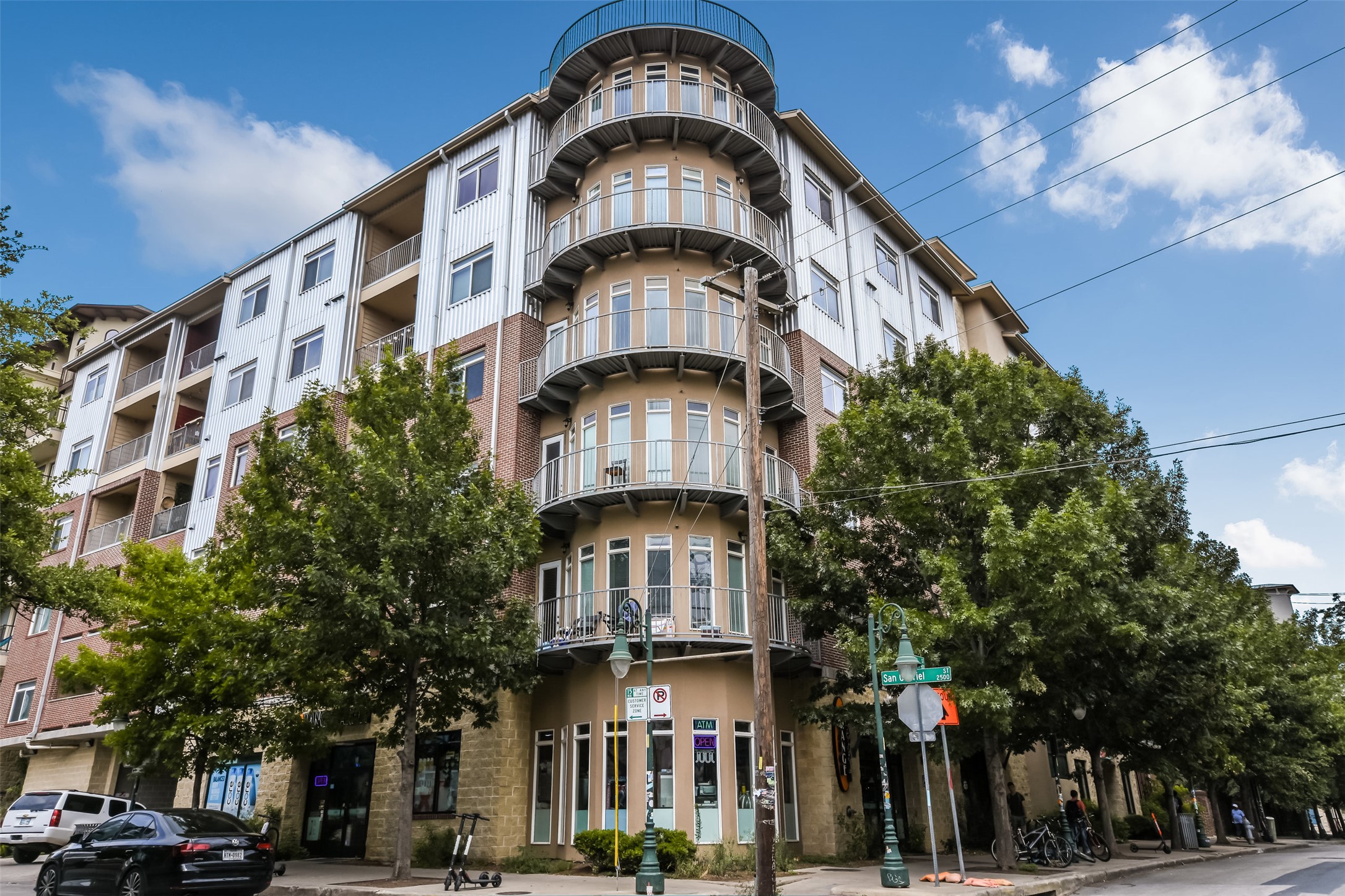 910 West 25th Street, Unit 503 Austin, TX 78705 - Photo 1 of 24 a tall building with a clock on the top of it