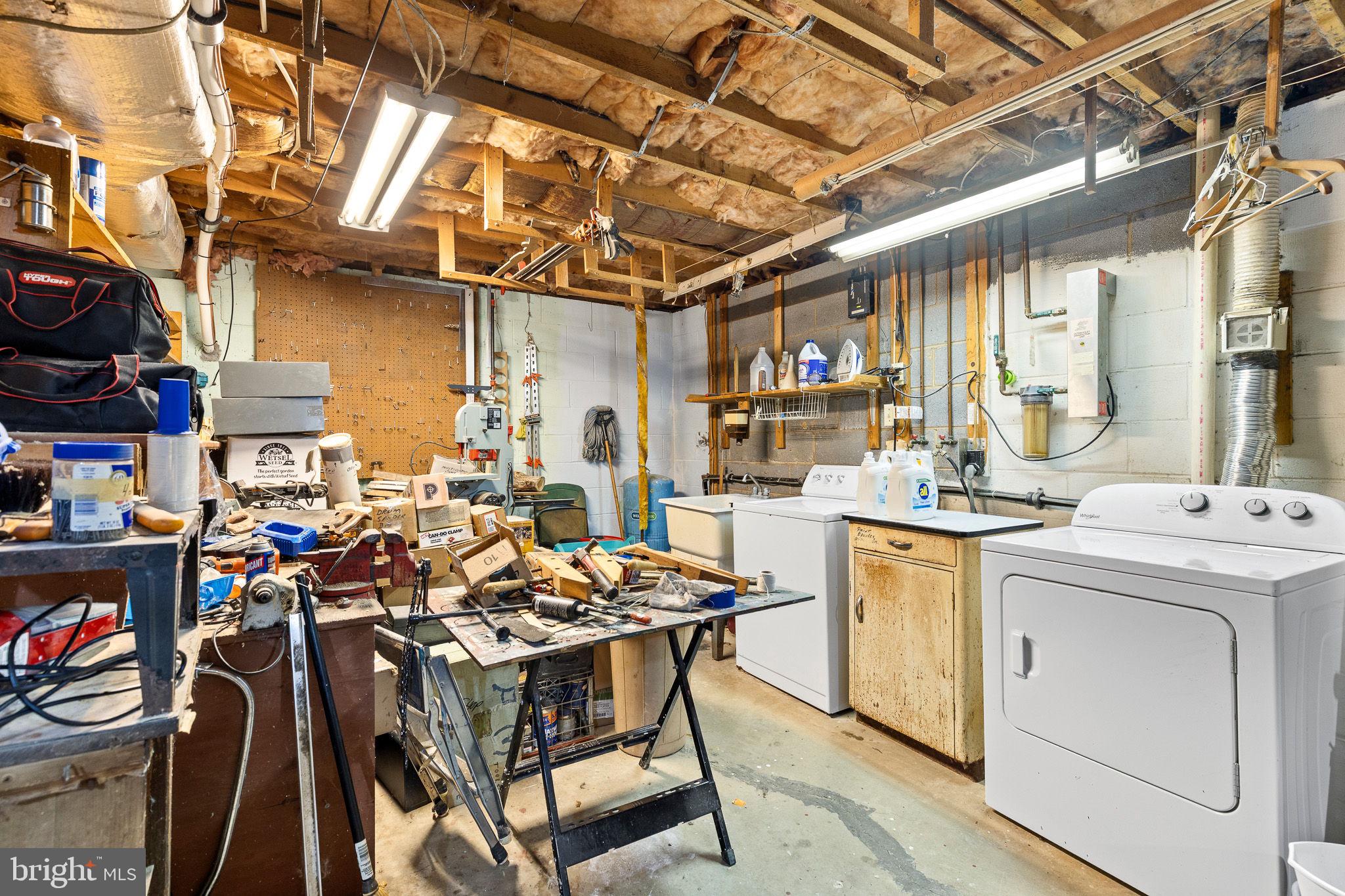 6794 Ottobine Road Dayton, VA 22821 - Photo 25 of 32 a view of a dining room with furniture and a chandelier