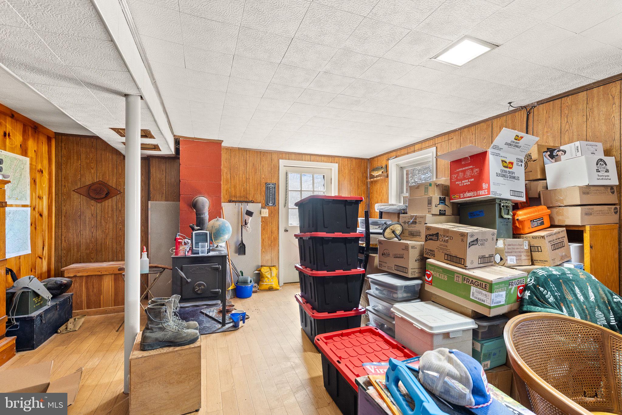 6794 Ottobine Road Dayton, VA 22821 - Photo 27 of 32 a living room with furniture a rug and a large window
